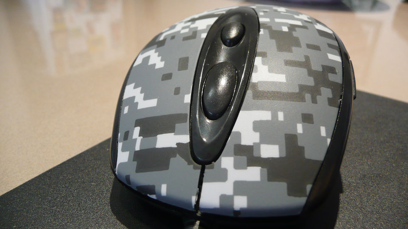 Illustration for article titled Hori's TAC3 Brings a Mouse and (Tiny) Keyboard to the PS3